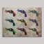 «Nine Revolvers» par Michael Tompsett, impression-18659967-26131176