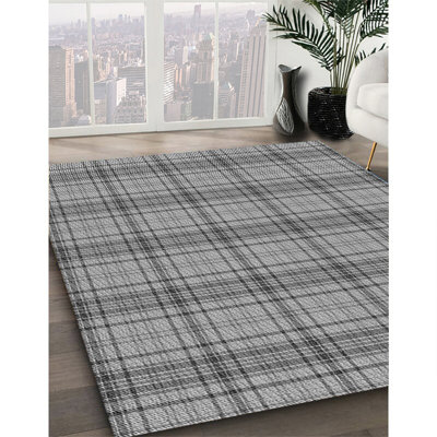 Tapis gris tissé à la machine