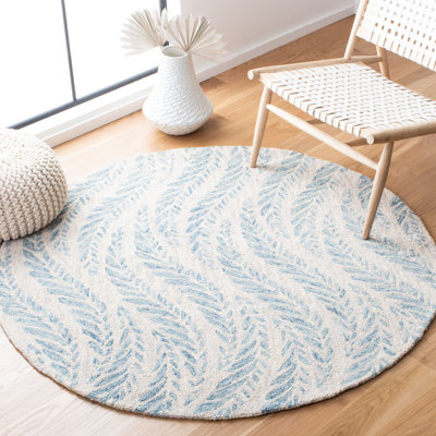 Ryleigh Abstract Handmade Tufted Area Rug in Ivory/Blue