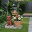 Statue d'extérieur de jardinière solaire chiot assis