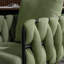 Fauteuil capitonné de couleur olive