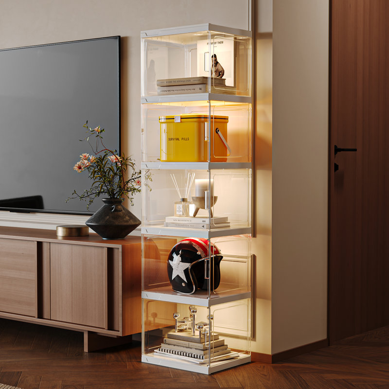 Vitrine Maebri, armoire de rangement en plastique avec lumières DEL réglables - élégant rangement sur pied blanc.