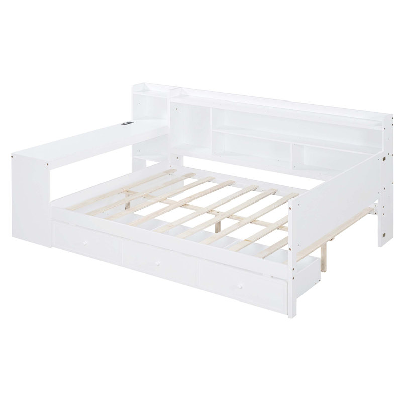 Lit de jour double en bois avec trois tiroirs, ports USB et bureau, idéal pour un repos confortable et un travail efficace