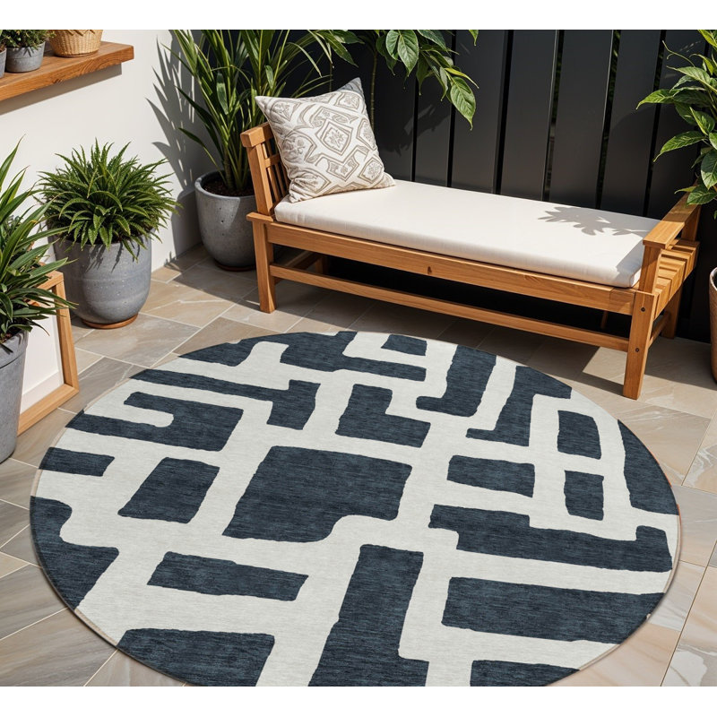 Tapis rond noir et ivoire 8 po
