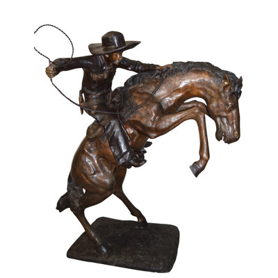 Bronco Buster Giant Bronze Statue -  Size: 65"L X 52"W X 64"H.