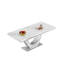 Rectangular dining table with a white marble-print top and a curved silver pedestal base.