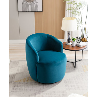 Fauteuil pivotant en velours bleu sarcelle, forme avec anneau en métal thermolaqué noir et fauteuil en mousse de sarcelle