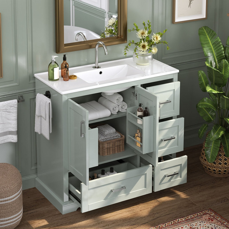 Meuble-lavabo 42 po vert menthe avec lavabo en céramique - Armoire autoportante à 4 tiroirs (top 2 avec séparateurs), portes à fermeture en douceur avec tablettes intérieures, porte-serviettes latéral réversible, poignées argentées, panneau de fibres à densité moyenne