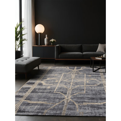 Tapis gris soyeux et moelleux