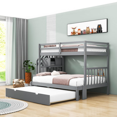 Ebarb Kids Twin Over Full 4 Drawers Wooden Bunk Bed with Twin Size Trundle and Shelves by Harriet Bee