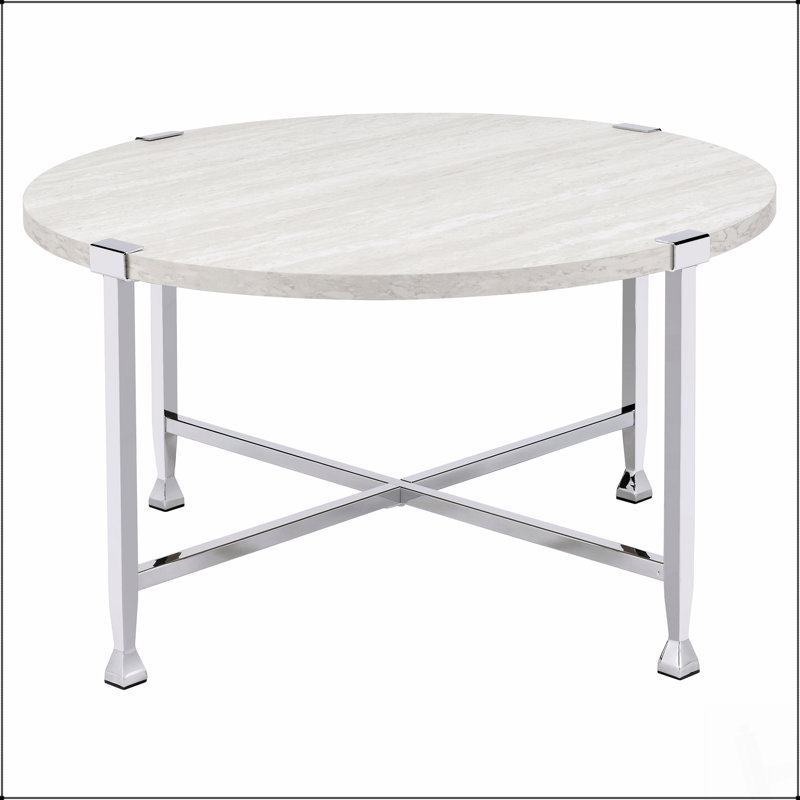 Table basse ronde en chêne blanc et chrome, parfaite pour l'élégance moderne et le charme industriel dans les espaces de vie contemporains.