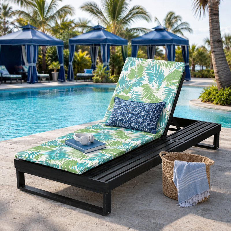Chaise longue noire en bois d'acacia avec coussin à motif de feuilles tropicales et dossier inclinable réglable