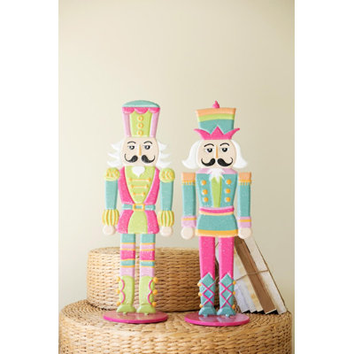 SET OF TWO PAINTED METAL NUTCRACKERS