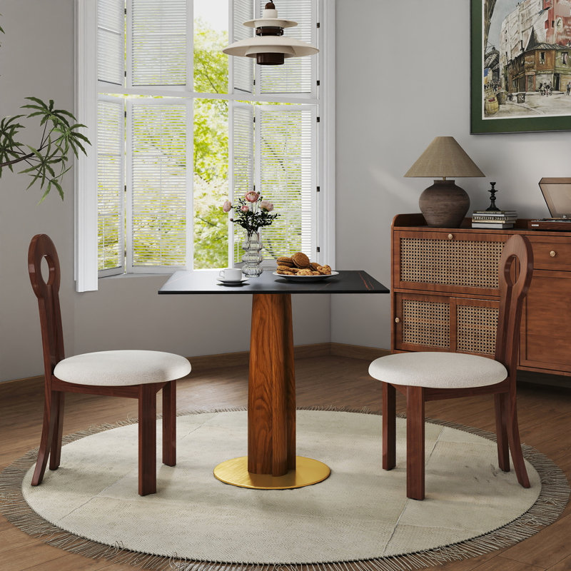 Table de salle à manger rectangulaire moderne de 85 cm (33,5 po) en pierre frittée avec pieds en bois et base dorée, idéale pour deux postes de travail dans les petits espaces, les repas à domicile ou les bureaux. Surface teintée.