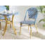 Gesine 4 - Person Wicker Patio Dining Set with Round Table , Cushions Included
