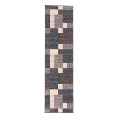 Tapis bleu touffeté à motif géométrique Allyne