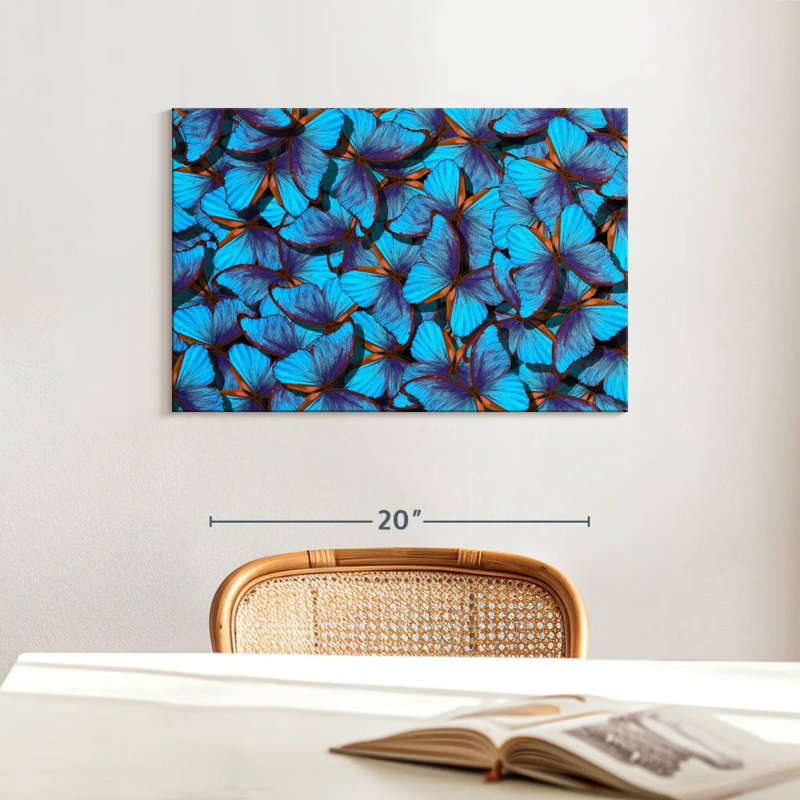 Essaim de papillons bleus