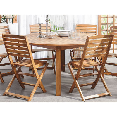 Golitz 6 - Person Acacia Wood Patio Dining Set with Round Table , Cushions Included