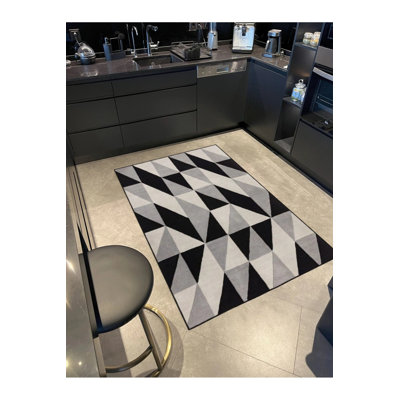 Tapis tissé pastel peint à rayures triangulaires