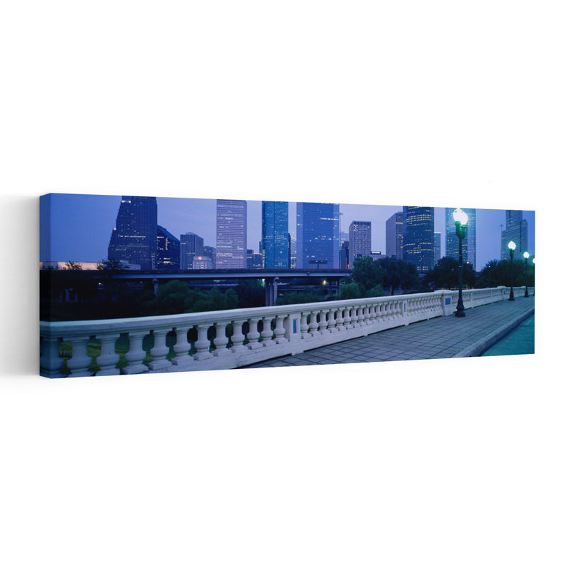 Buildings Lit Up At Dusk Houston Texas USA by Jerry Driendl Photography - Wrapped Canvas Panoramic Print