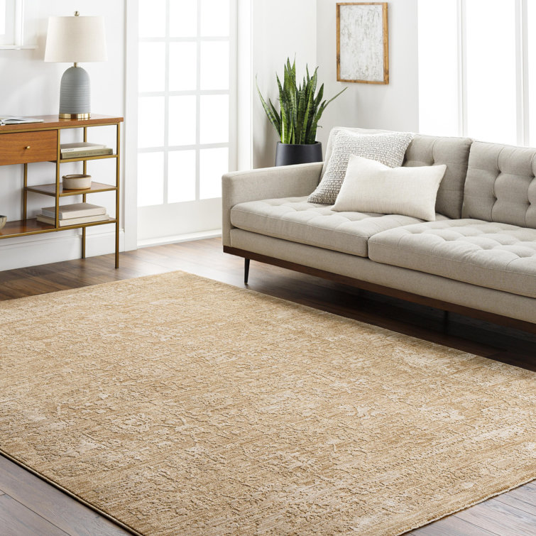 Alonzo Solid Color Machine Woven Polyester Area Rug in Beige