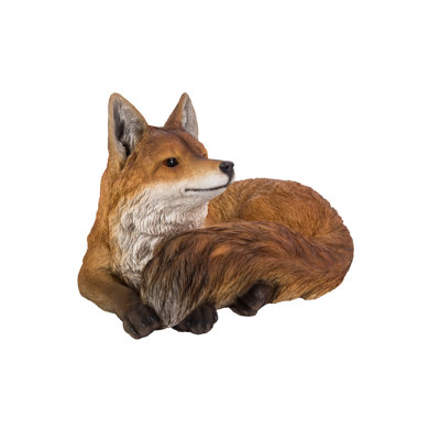 Statue renard allongé