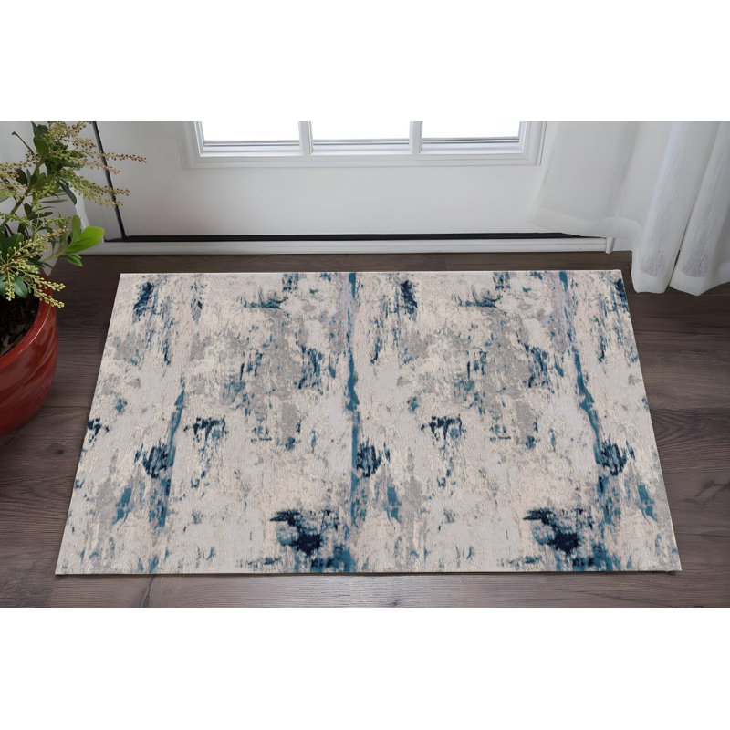 Tapis abstrait bleu et crème 2 pi x 5 pi