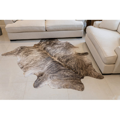 Tapis en cuir fabriqué à la main bringé
