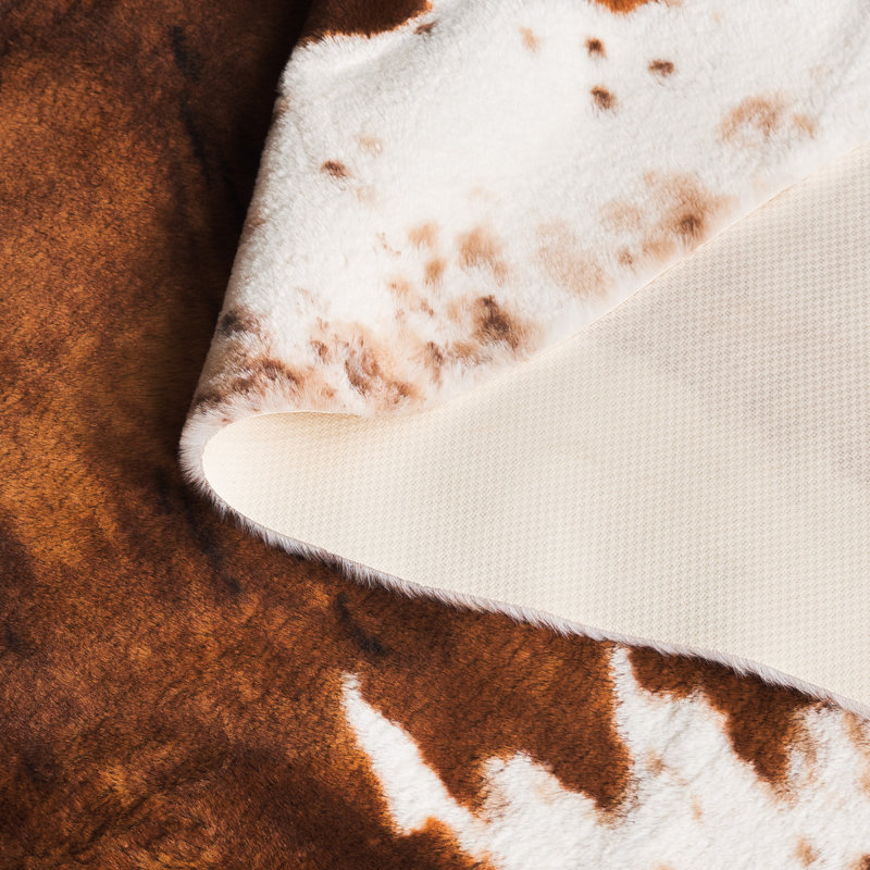Faux Cowhide 300 Performance Animal Print Rug