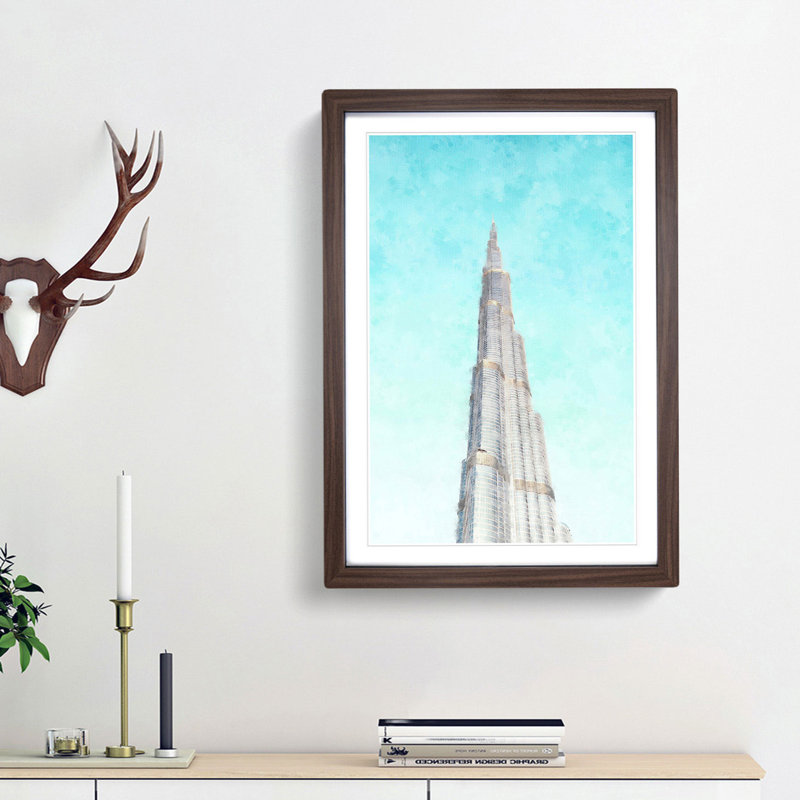 Point of the Burj Khalifa in Dubai - Picture Frame Graphic Art Print, Walnut Framed, 87cm H x 62cm W x 2cm D