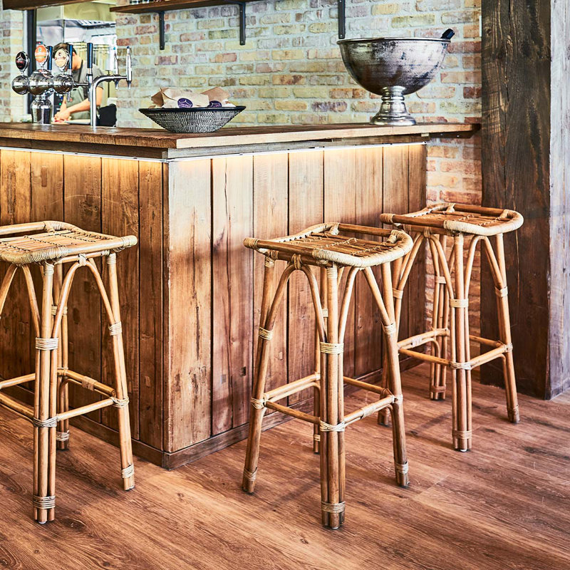 Antique Brown Rattan Saddle Style Bar Stool