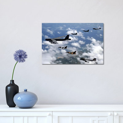 A B-52 Stratofortress Leads A Formation Of Aircraft Over Guam I by Stocktrek Images - Wrapped Canvas Print