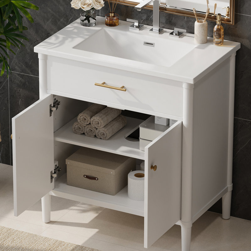 Meuble-lavabo blanc 31 po avec lavabo, charnières à fermeture en douceur, tablettes intérieures réglables, forme incurvée, pieds en bois d'hévéa, poignées dorées mates, élégant pour les salles de bain de style bord de mer en blanc, profil en céramique