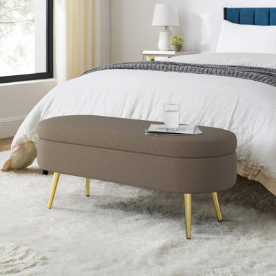 Banc de rangement repose-pieds ovale en flanelle avec pieds en métal brun (43,5 po x 16 po x 16 po)