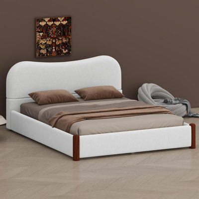 Lit plateforme contemporain tapissier avec pieds de support en bois