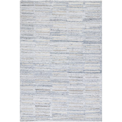 Calgary Hand Tufted Area Rug in Cream