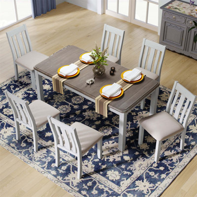 7-Piece Dining Table Set with Extendable Table and 6 Upholstered Chairs, Ideal for Family Gatherings and Special Occasions by Ivy Bronx