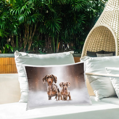 Coussin extérieur Snowy Dachshund Puppies par Natalie Grosse