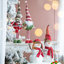 Ensemble de 2 gnomes de Noël debout en tenue festive