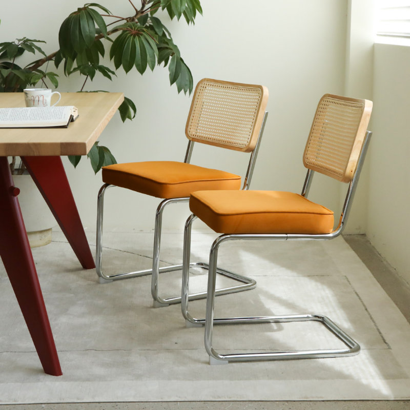 Tristen Rattan and Fabric Upholstered Dining Chairs, Orange, Silver