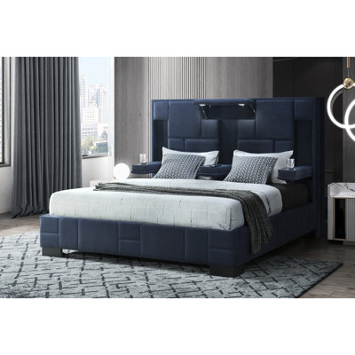 Très grand lit en bleu marine, style moderne, pliable, charge sans fil centrale et haut-parleurs encastrés avec panneau bleu contemporain et lampes de lecture à DEL
