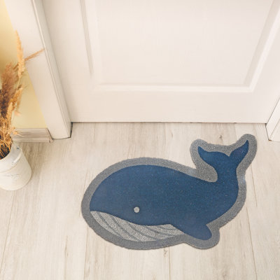 Paillasson bleu en forme de baleine