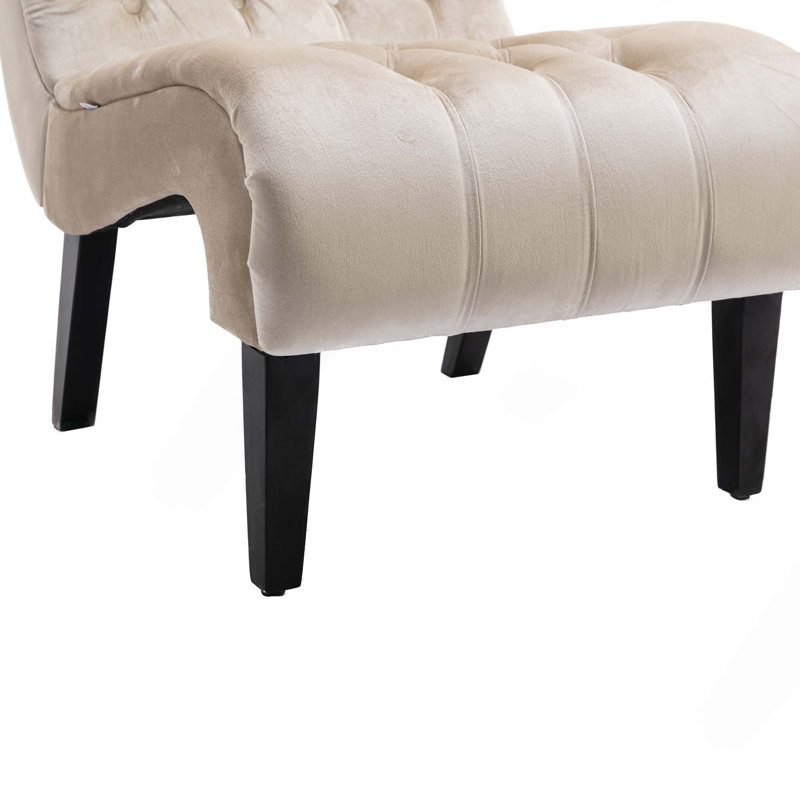 Fauteuil d'appoint sans accoudoirs en velours avec capitonnage et pieds en bois robustes