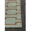 Tapis en laine et en coton à chevrons tissé à plat à la main à motif géométrique vert et orange Chevella-465139245