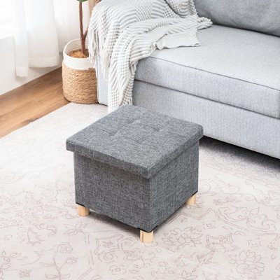 Repose-pieds pliant avec rangement et plateau en bois