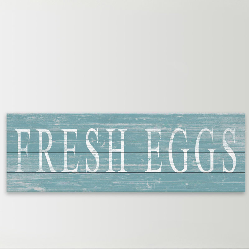 "Oeufs frais-sans cadre", art textuel sur bois, H 15 po x l 45 po x P 1,5 po