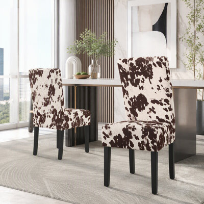Chaise contemporaine en velours avec accoudoirs