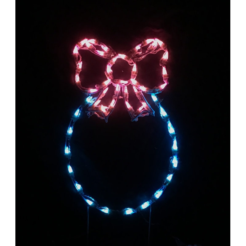 Œuf peint avec nœud lumineux