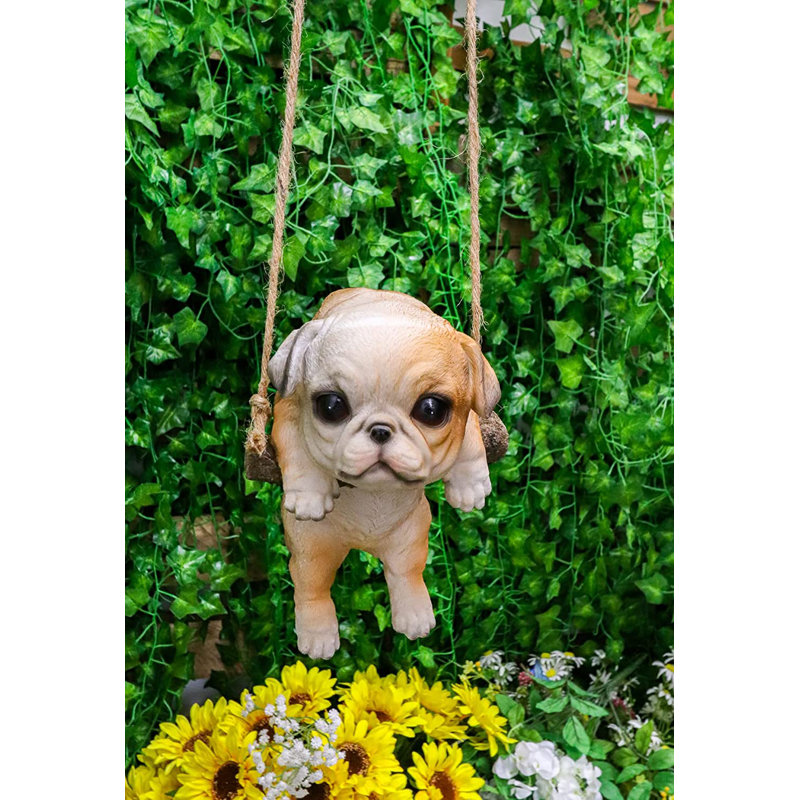 Figurine chiot sur une branche en macramé