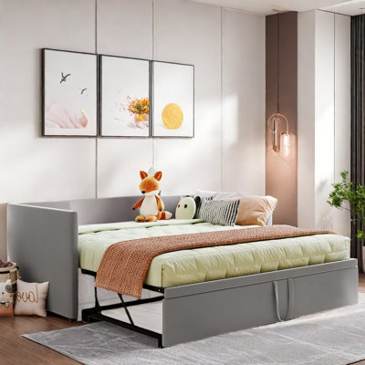 Upholstered Daybed with Pop Up Trundle Amala
